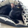 Black, White & Grey Paw Print Canvas Cave Cat Bed from Armarkat